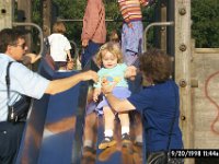 Sliding Down  Nana & Grandad help Chloe come down the slide
