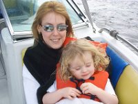 A Comfy Spot  Sheri holds Chloe while they ride on the boat they rented (a few minutes later they were drenched by a wave while Helen was driving) : Andy Poulter,Sheri Poulter