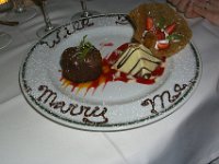 "Will You Marry Me?"  Andy had the chef prepare this plate for Sheri!  The ring was in the strawberry at the right!