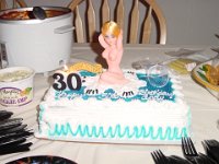The Birthday Cake!  Andy's cake had a naked blonde on a bear rug made from frosting!