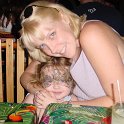 All Snuggles!  Sheri & Chloe snuggle at the Rain Forest Cafe when they hear the thunder & lightening!