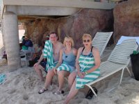 The White Pipers  Sheri, Liz & Randy find some shade on the beach at the Atlantis Hotel