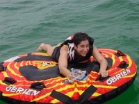 A Brave Girl!  Lisa (who is afraid of "sea creatures") decided to go out on the tube which was being pulled by our boat