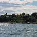 Sailing Along  People live on this beautiful island of hills