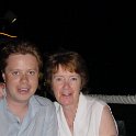 Mum & Son  Andy & Mum at a windy restaurant on the beach...is that a wine glass still full?