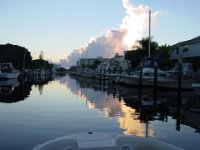 Just Leaving  The boat is just leaving Hidden Harbour Marina...there are tons of boats along the side so you have to go really slow to get to the intercoastal.