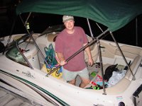 All in a Night's Work  Andy starts cleaning up the boat from their day "at sea"