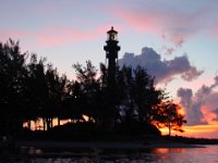 Sunset  A beautiful picture of the light house...the marker to find the inlet