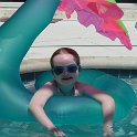 "My Private Palm Tree"  Chloe wraps herself up in her raft for some shade from the hot Florida sun!
