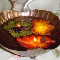 A Good Centerpiece is Hard to Find!  Sheri finally found a fabulous leaf bowl with some fall leaves as floating candles...she was so proud of herself.