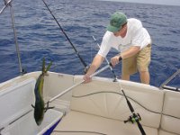 No Fear  Andy throws the fish in the cooler!