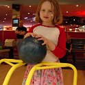 Queen of Bowling  Chloe gets some help getting the big ball down the lane!  I think she beat my score!