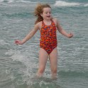 DSC01696  Chloe braves the ocean!