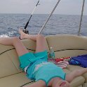 Upside Down!  Chloe finds a strange way to sit on the boat!