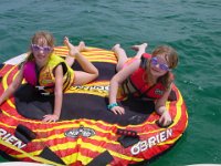 Time for Tubin'!  Alexandra & Chloe go for a ride on the tube behind the boat