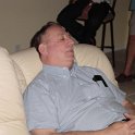 All Tuckered Out  Dad passes out on the couch while everyone dances around him!  Just a little embarassing, Dad!