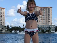 Thumbs Up!  Ashley thinks being on the boat is awesome!
