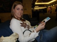 Waiting to Board  Sheri reads a magazine at West Palm Beach Airport