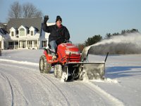 I Feel So Cool!  Steve waves from his tractor!