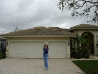 Sheri inspects the damage after Wilma  Sheri inspecting our house for damage after Hurricane Wilma