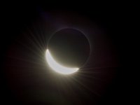 2017 Total Solar Eclipse  The last glimmer of the sun is seen as the moon makes its final move over the sun during the total solar eclipse on Monday, August 21, 2017 above Madras, Oregon. A total solar eclipse swept across a narrow portion of the contiguous United States from Lincoln Beach, Oregon to Charleston, South Carolina. A partial solar eclipse was visible across the entire North American continent along with parts of South America, Africa, and Europe.  Photo Credit: (NASA/Aubrey Gemignani) : Madras, Oregon, Sun, Total Solar Eclipse