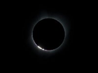 2017 Total Solar Eclipse  The Bailey's Beads  effect is seen as the moon makes its final move over the sun during the total solar eclipse on Monday, August 21, 2017 above Madras, Oregon. A total solar eclipse swept across a narrow portion of the contiguous United States from Lincoln Beach, Oregon to Charleston, South Carolina. A partial solar eclipse was visible across the entire North American continent along with parts of South America, Africa, and Europe.  Photo Credit: (NASA/Aubrey Gemignani) : Bailey's Beads Effect, Madras, Oregon, Sun, Total Solar Eclipse, Totality